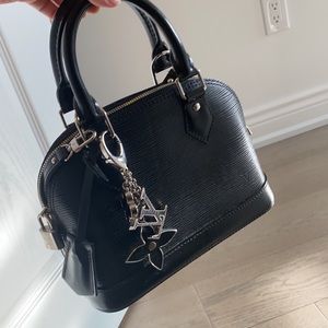 SOLD / Louis Vuitton alma bb with bag charm